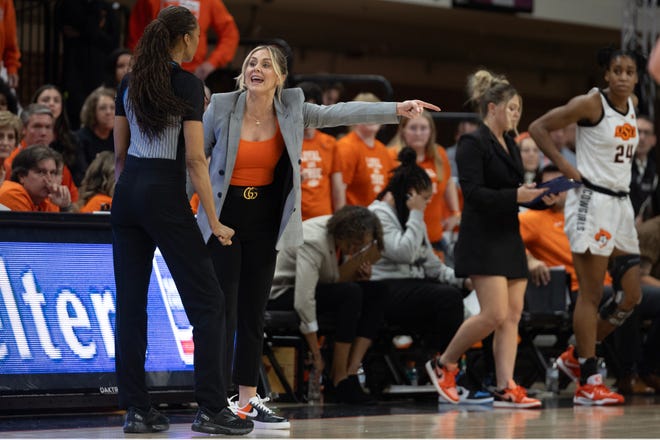 Jan 20, 2024; Stillwater, Okla, USA; Oklahoma State Cowgirls head coach Jacie Hoyt talks with the referee on the baseline in the first half of a womenÕs NCAA basketball game against the Texas Longhorns at Gallagher Iba Arena. Mandatory Credit: Mitch Alcala-The Oklahoman. Mandatory Credit: Mitch Alcala-The Oklahoman