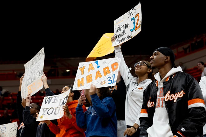 Jan 20, 2024; Stillwater, Okla, USA; Oklahoam State Fans hold up signs in the stands during the second half of a womenÕs NCAA basketball game against the Texas Longhorns at Gallagher Iba Arena. Mandatory Credit: Mitch Alcala-The Oklahoman. Mandatory Credit: Mitch Alcala-The Oklahoman
