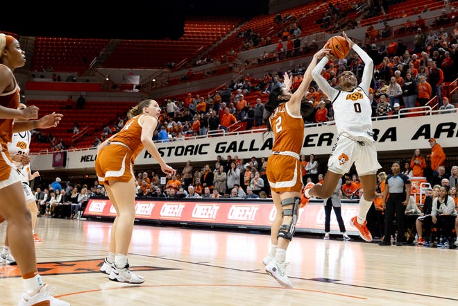 Jan 20, 2024; Stillwater, Okla, USA; Texas Longhorns guard Shaylee Gonzales (2) blocks Oklahoma State Cowgirls guard Quincy NobleÕs (0) shot in the second half of a womenÕs NCAA basketball game at Gallagher Iba Arena. Mandatory Credit: Mitch Alcala-The Oklahoman. Mandatory Credit: Mitch Alcala-The Oklahoman