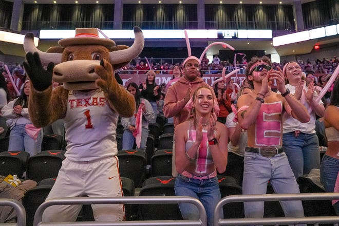 Texas mascot HookEm and the Longhorns Hellraisers dance during the Feb. 17 Texas-Iowa State women's basketball game at Moody Center. Texas, seeded No. 1 in this year's NCAA Tournament, plays Drexel at Moody in Friday's first round.