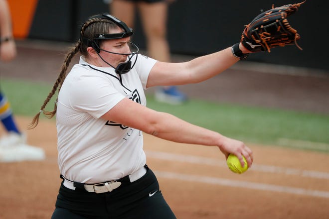 Oklahoma State's Kyra Aycock (34) pitches during a college softball game between the Oklahoma State University Cowgirls and the South Dakota State Jackrabbits, Tuesday, Feb. 27, 2024.