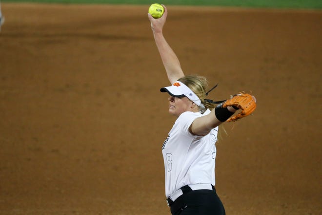Oklahoma State's Lexi Kilfoyl (8) pitches in the second softball game of a double header between the Oklahoma State University Cowgirls and the South Dakota State Jackrabbits, Tuesday, Feb. 27, 2024.