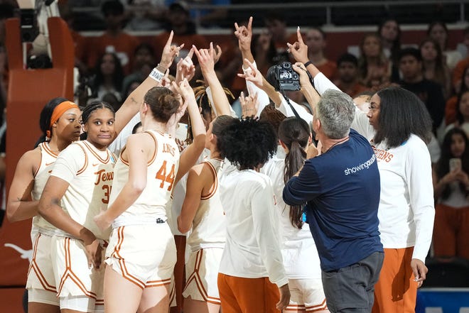 Texas huddles together before taking on the Drexel Dragons in round one of the NCAA women's basketball tournament at the Moody Center in Austin Friday, March 22, 2024.