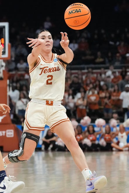 Texas Longhorns guard Shaylee Gonzales (2) passes to a teammate as Texas takes on the Drexel Dragons in round one of the NCAA women's basketball tournament at the Moody Center in Austin Friday, March 22, 2024.