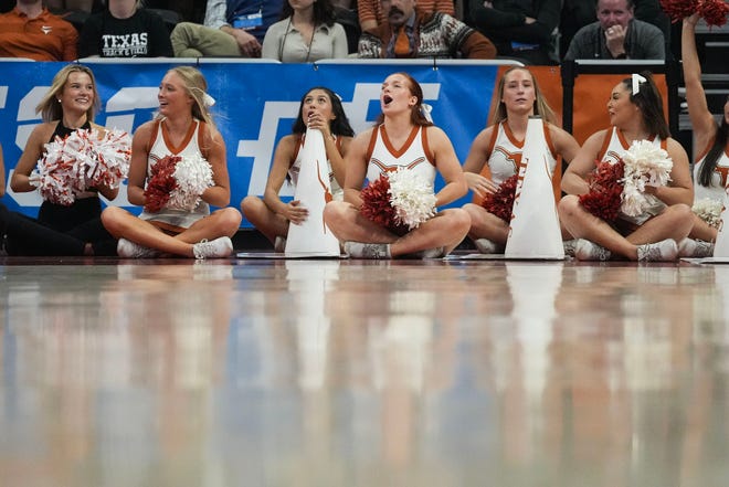 Texas cheerleaders cheer as Texas takes on the Drexel Dragons in round one of the NCAA women's basketball tournament at the Moody Center in Austin Friday, March 22, 2024.