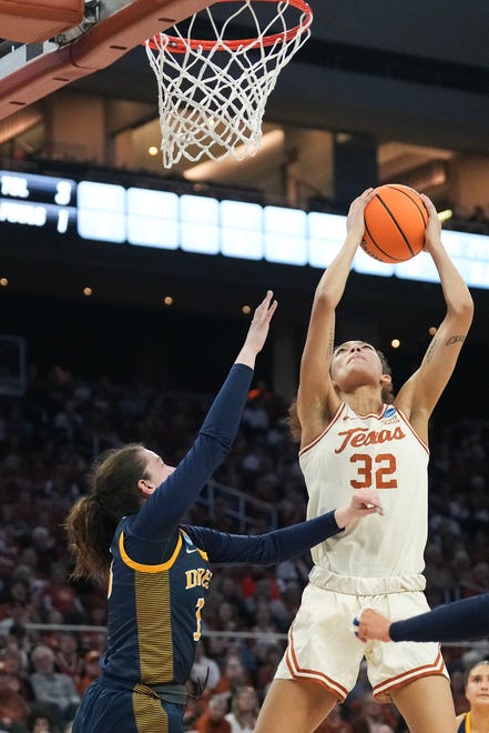 Texas Longhorns guard Ndjakalenga Mwenentanda (32) jumps to shoot the ball as Texas takes on the Drexel Dragons in round one of the NCAA women's basketball tournament at the Moody Center in Austin Friday, March 22, 2024.