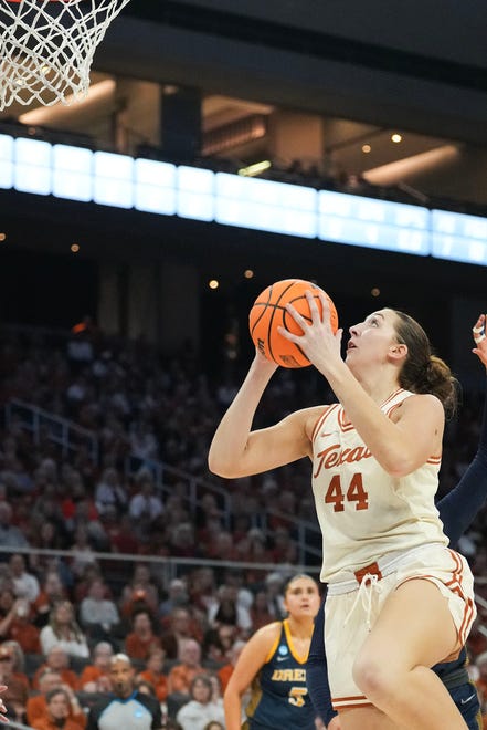 Texas Longhorns forward Taylor Jones (44) jumps to shoot the ball as Texas takes on the Drexel Dragons in round one of the NCAA women's basketball tournament at the Moody Center in Austin Friday, March 22, 2024.