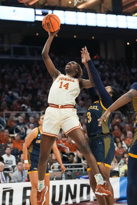 Texas Longhorns forward Amina Muhammad (14) shoots the ball as Texas takes on the Drexel Dragons in round one of the NCAA women's basketball tournament at the Moody Center in Austin Friday, March 22, 2024.