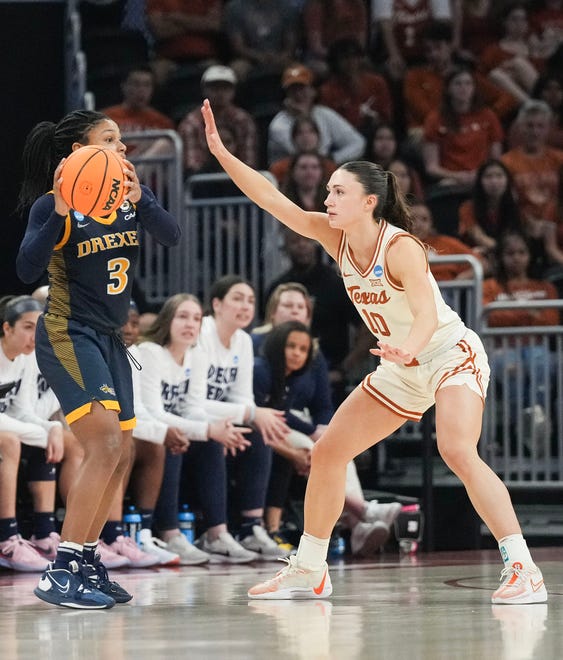 Texas Longhorns guard Shay Holle (10) guards Drexel Dragons guard Amaris Baker (3) as Texas takes on the Drexel Dragons in round one of the NCAA women's basketball tournament at the Moody Center in Austin Friday, March 22, 2024.