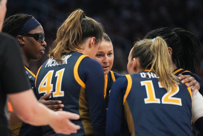 Drexel players huddle as Texas takes on the Drexel Dragons in round one of the NCAA women's basketball tournament at the Moody Center in Austin Friday, March 22, 2024.
