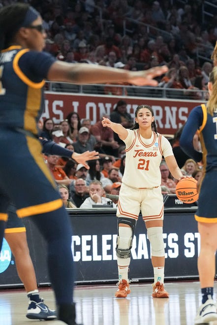 Texas Longhorns guard Gisella Maul (21) calls out a play as Texas takes on the Drexel Dragons in round one of the NCAA women's basketball tournament at the Moody Center in Austin Friday, March 22, 2024.