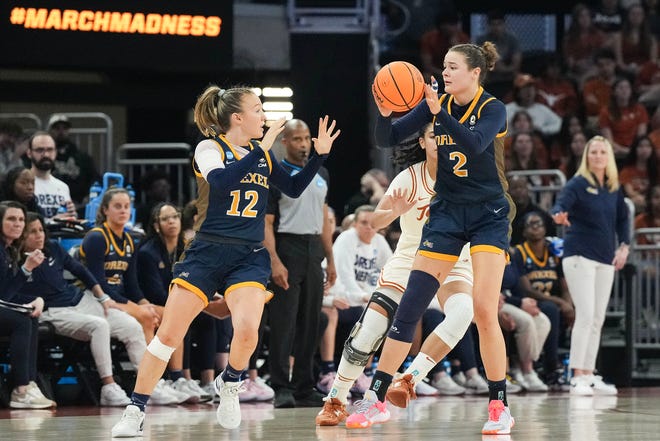 Drexel Dragons forward Hetta Saatman (2) passes to Drexel Dragons guard Grace O'Neill (12) as Texas takes on the Drexel Dragons in round one of the NCAA women's basketball tournament at the Moody Center in Austin Friday, March 22, 2024.