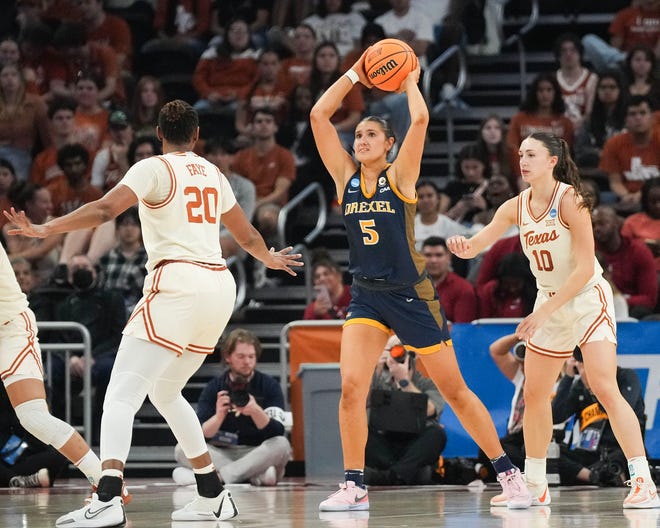 Texas Longhorns forward Khadija Faye (20) and Texas Longhorns guard Shay Holle (10) guard Drexel Dragons forward Chloe Hodges (5) as Texas takes on the Drexel Dragons in round one of the NCAA women's basketball tournament at the Moody Center in Austin Friday, March 22, 2024.