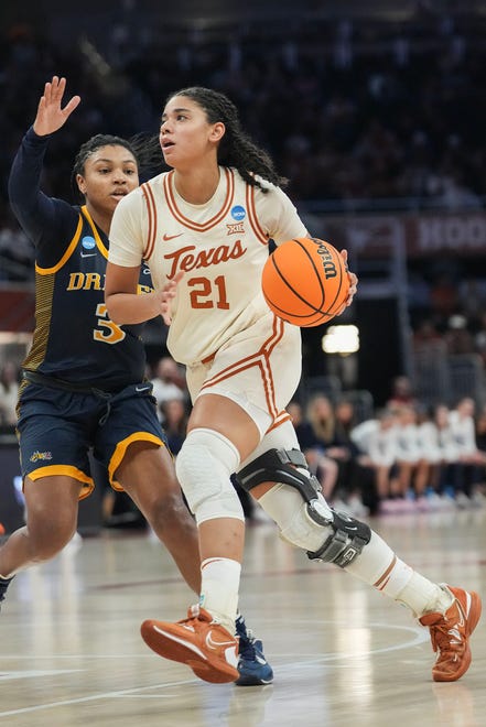 Texas Longhorns guard Gisella Maul (21) dribbles toward the basket as Texas takes on the Drexel Dragons in round one of the NCAA women's basketball tournament at the Moody Center in Austin Friday, March 22, 2024.
