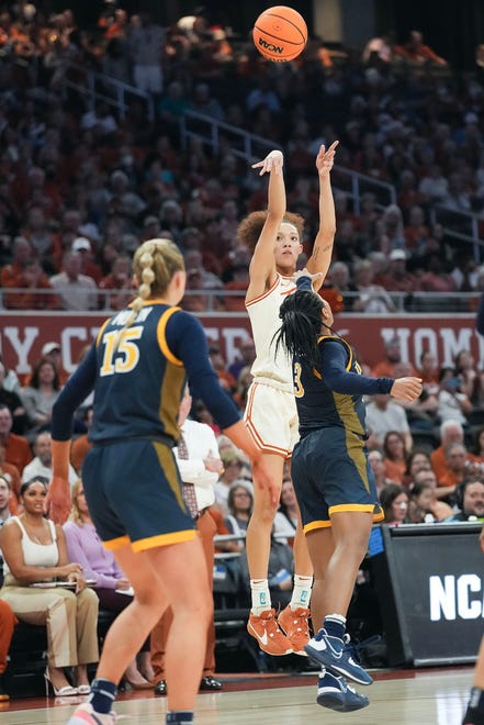 Texas Longhorns guard Ndjakalenga Mwenentanda (32) shoots a basket as Texas takes on the Drexel Dragons in round one of the NCAA women's basketball tournament at the Moody Center in Austin Friday, March 22, 2024.