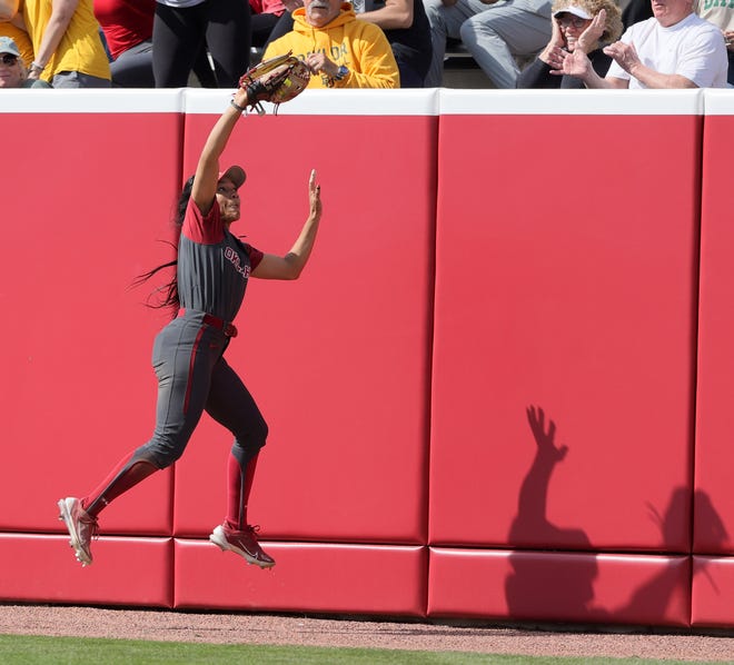 Oklahoma's Rylie Boone (0) catches the ball for an out in the fourth inning of a college softball game between the University of Oklahoma Sooners (OU) and the Baylor Bears in Norman, Okla., Saturday, March 23, 2024.