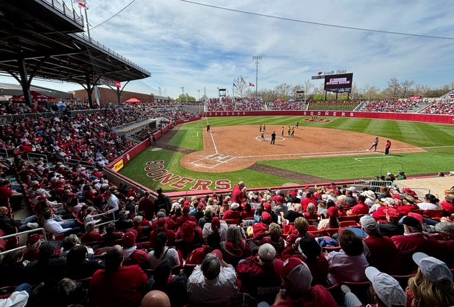 Fans watch during a college softball game between the University of Oklahoma Sooners (OU) and the Baylor Bears in Norman, Okla., Saturday, March 23, 2024.