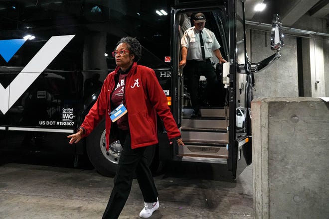 Alabama deputy director of athletics Karin Lee exits the bus at the Moody Center for the NCAA playoff game against the Texas Longhorns on Sunday, Mar. 23, 2024 in Austin.