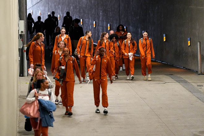 The Texas Longhorns arrive at the Moody Center for the NCAA playoff game against Alabama on Sunday, Mar. 23, 2024 in Austin.