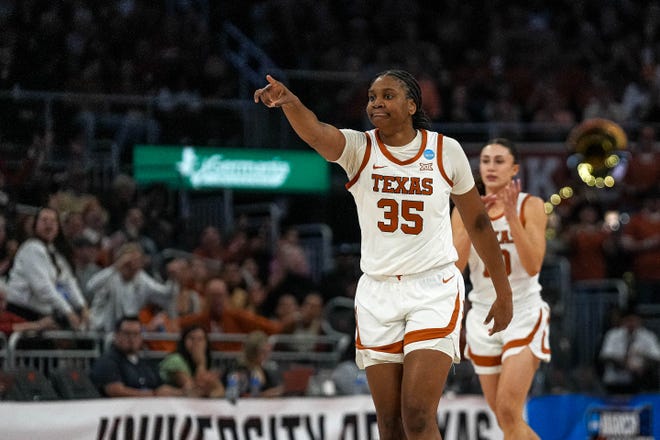 Texas Longhorns forward Madison Booker (35) celebrates a score during the NCAA playoff game against Alabama at the Moody Center on Sunday, Mar. 23, 2024 in Austin.