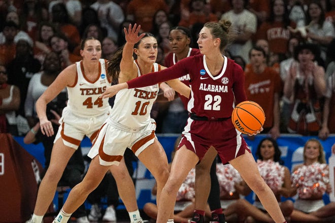 Texas Longhorns guard Shay Holle (10) guards Alabama guard Karly Weathers (22) during the NCAA playoff game at the Moody Center on Sunday, Mar. 23, 2024 in Austin.