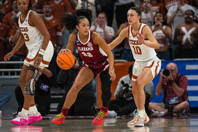 Texas Longhorns guard Shay Holle (10) guards Alabama forward Aaliyah Nye (32) during the NCAA playoff game at the Moody Center on Sunday, Mar. 23, 2024 in Austin.