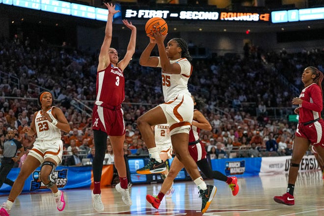 Texas Longhorns forward Madison Booker (35) shoots over Alabama guard Sarah Barker (3) during the NCAA playoff game at the Moody Center on Sunday, Mar. 23, 2024 in Austin.