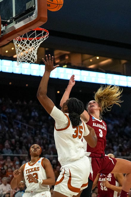 Texas Longhorns forward Madison Booker (35) shoots over Alabama guard Sarah Barker (3) during the NCAA playoff game at the Moody Center on Sunday, Mar. 23, 2024 in Austin.