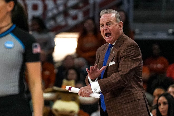 Texas Longhorns head coach Vic Schaefer yells instructions from the sideline during the NCAA playoff game against Alabama at the Moody Center on Sunday, Mar. 23, 2024 in Austin.