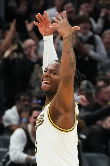 Purdue Boilermakers guard Lance Jones (55) celebrates after scoring, Sunday, March 24, 2024, during the second round of the NCAA Men’s Basketball Tournament at Gainbridge Fieldhouse in Indianapolis. The Purdue Boilermakers defeated the Utah State Aggies 106-67.