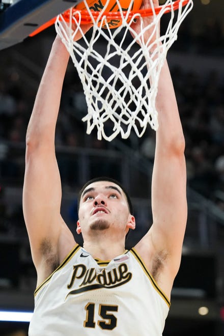 Purdue Boilermakers center Zach Edey (15) dunks the ball against the Utah State Aggies on Sunday, March 24, 2024, during the second round of the NCAA Men’s Basketball Tournament at Gainbridge Fieldhouse in Indianapolis. The Purdue Boilermakers defeated the Utah State Aggies 106-67.