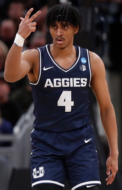 Utah State Aggies guard Ian Martinez (4) reacts after scoring during NCAA Men’s Basketball Tournament game against the Purdue Boilermakers, Sunday, March 24, 2024, at Gainbridge Fieldhouse in Indianapolis.