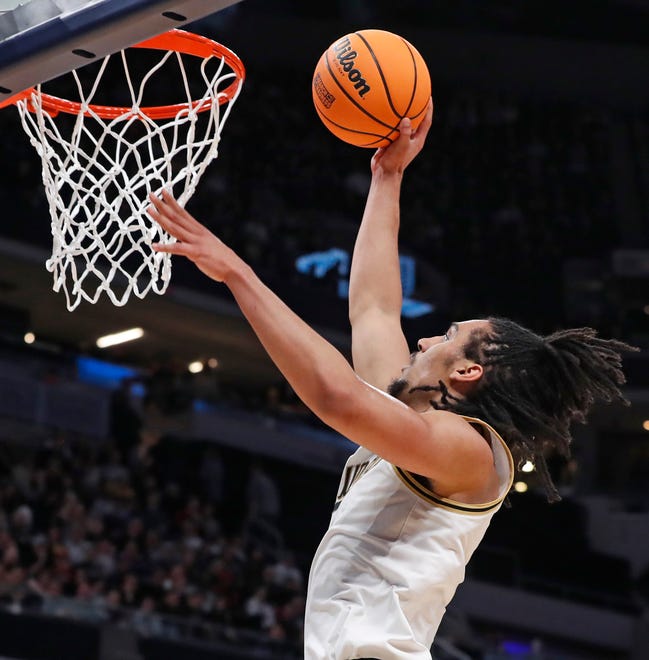 Purdue Boilermakers forward Trey Kaufman-Renn (4) shoots the ball during NCAA Men’s Basketball Tournament game against the Utah State Aggies, Sunday, March 24, 2024, at Gainbridge Fieldhouse in Indianapolis. Purdue Boilermakers won 106-67.