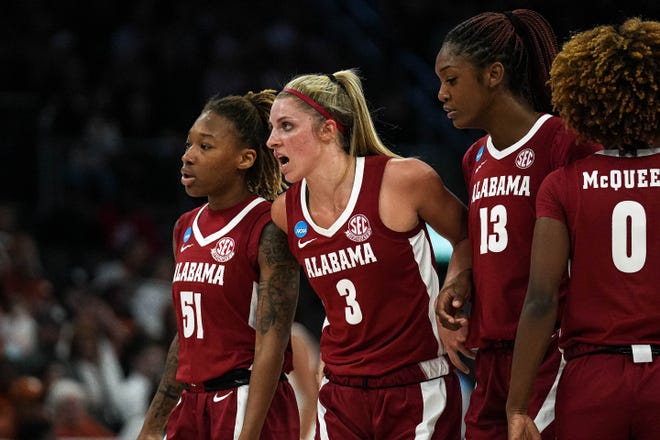 Alabama guard Sarah Barker (3) pushes past team mates to talk to an official during the NCAA playoff game against the Texas Longhorns at the Moody Center on Sunday, Mar. 23, 2024 in Austin.