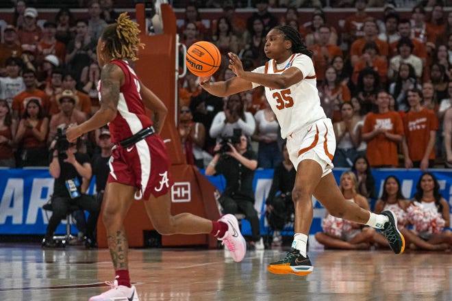 Texas Longhorns guard Madison Booker (35) passes the ball during the NCAA playoff game against Alabama at the Moody Center on Sunday, Mar. 23, 2024 in Austin.