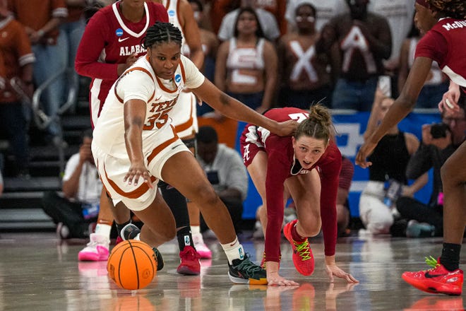 Texas Longhorns guard Madison Booker (35) dives for a loose ball during the NCAA playoff game against Alabama at the Moody Center on Sunday, Mar. 23, 2024 in Austin.