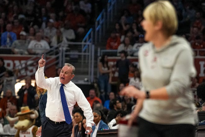 Texas Longhorns head coach Vic Schaefer yells instructions from the sideline during the NCAA playoff game against Alabama at the Moody Center on Sunday, Mar. 23, 2024 in Austin.