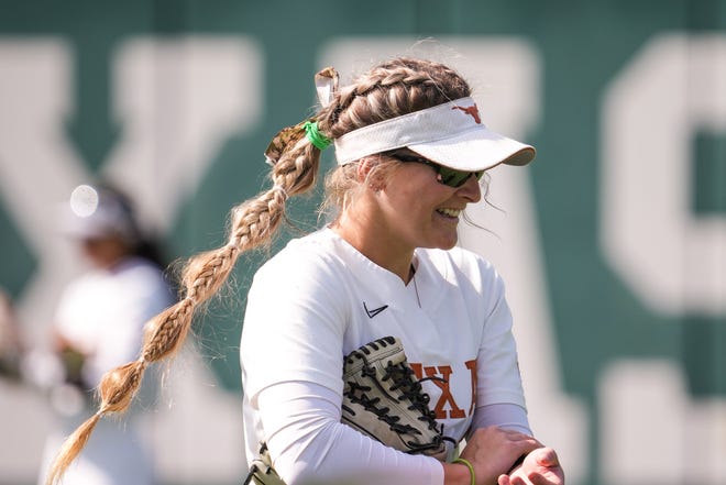 Outfielder Ashton Maloney had three of the Longhorns' 16 hits Friday in a 14-1 win at Baylor. The Big 12 softball series resumed Saturday in Austin.