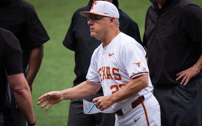 Texas Longhorns Head Coach David Pierce speaks to the umpires ahead of the Longhorns' game against the TCU Horned Frogs at UFCU Disch-Falk Field, Friday, April 19, 2024.