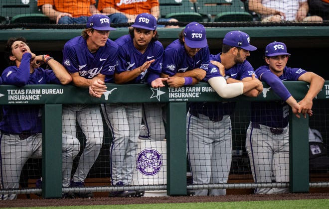 The TCU team watch from the dugout in the third inning of the Texas Longhorns' game against the TCU Horned Frogs at UFCU Disch-Falk Field, Friday, April 19, 2024.