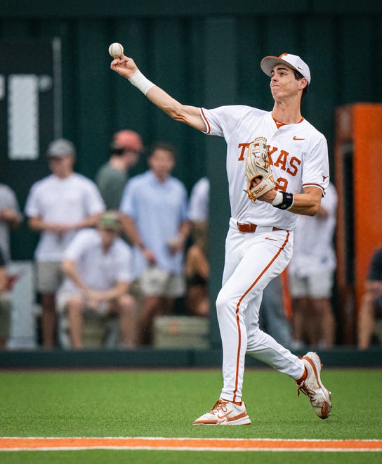 Texas Longhorns outfielder Will Gasparin (8) throws the ball to a teammate in the third inning of the Longhorns' game against the TCU Horned Frogs at UFCU Disch-Falk Field, Friday, April 19, 2024.