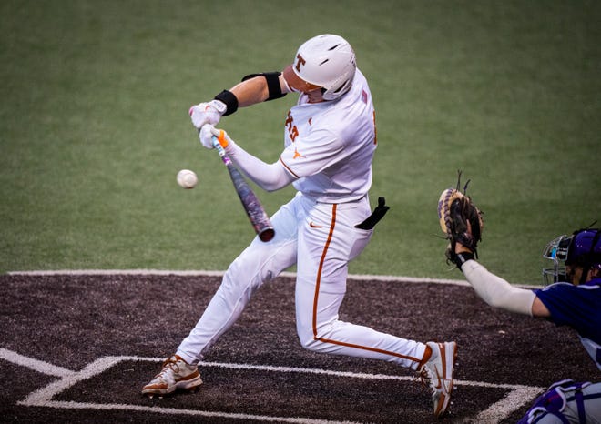 Texas Longhorns infielder Jared Thomas (9) bats in the fourth inning of the Longhorns' game against the TCU Horned Frogs at UFCU Disch-Falk Field, Friday, April 19, 2024.