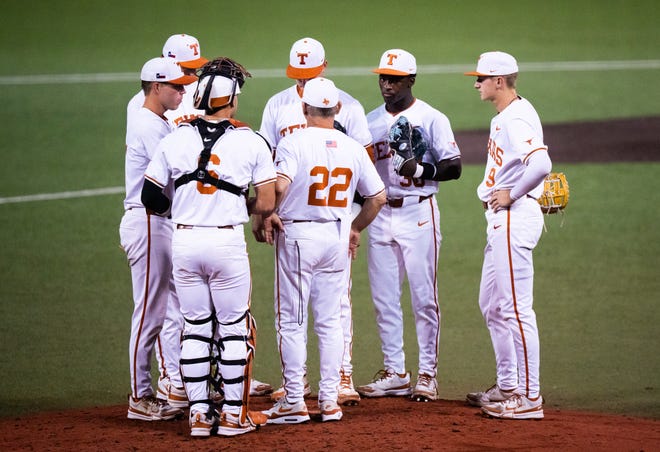 The Texas Longhorns meet on the mount in the sixth inning of the Texas Longhorns' game against the TCU Horned Frogs at UFCU Disch-Falk Field, Friday, April 19, 2024.