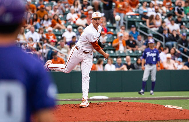 Texas Longhorns pitcher Max Grubbs (38) throws the ball to first base in a pickoff attempt from Texas during the second inning of the Longhorns' game against the TCU Horned Frogs at UFCU Disch-Falk Field, Friday, April 19, 2024.