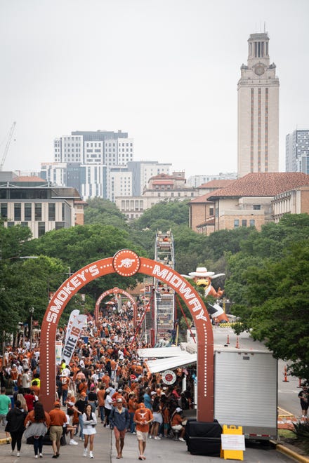 Texas fans fill up Smokey's Midway ahead of the Texas Longhorns' spring Orange and White game at Darrell K Royal Texas Memorial Stadium in Austin, Texas, April 20, 2024.
