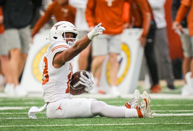 Texas White team wider receiver Ryan Niblett (18) celebrates making a catch for a first down in the second quarter of the Longhorns' spring Orange and White game at Darrell K Royal Texas Memorial Stadium in Austin, Texas, April 20, 2024.