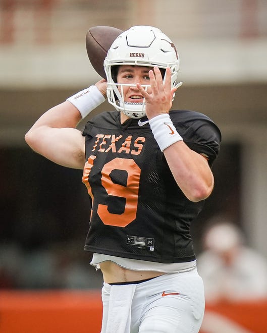 Texas Longhorns quarterback Cole Lourd (19) throws a pass to his teammates playing for Texas Orange in the fourth quarter of the Longhorns' spring Orange and White game at Darrell K Royal Texas Memorial Stadium in Austin, Texas, April 20, 2024.