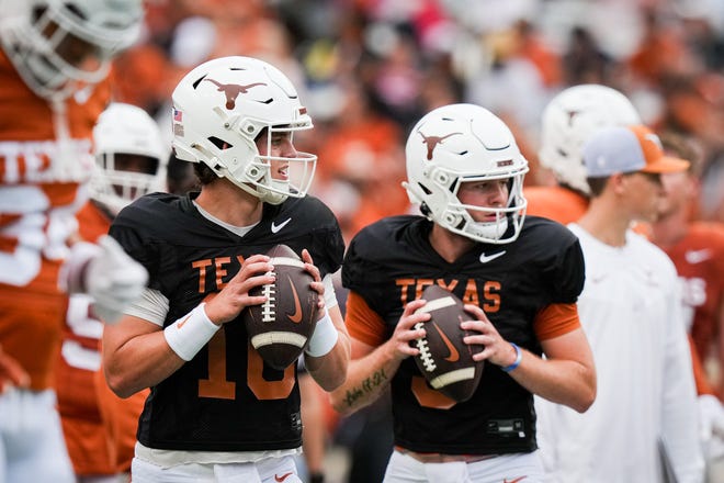 Texas Longhorns quarterbacks Arch Manning (16), left, and Quinn Ewers (3) throw passes while warming up ahead of the Longhorns' spring Orange and White game at Darrell K Royal Texas Memorial Stadium in Austin, Texas, April 20, 2024.