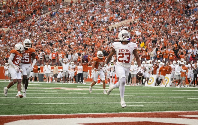 Texas White team running back Jaydon Blue runs the ball in for a touchdown in the Longhorns' spring Orange and White game at Darrell K Royal Texas Memorial Stadium in Austin, Texas, April 20, 2024.
