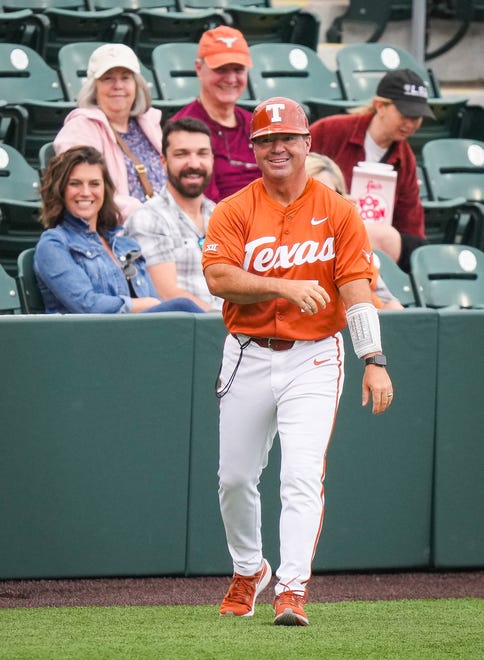 Texas Longhorns Assistant Coach Steve Rodriguez walks back to the dugout in the first inning of the Longhorns' game against the Mavericks at UFCU Disch-Falk Field, Tuesday, April 23, 2024. Rodriguez is acting head coach while David Pierce is suspended.